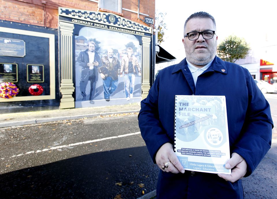 Martin Marchant at the mural to his late father